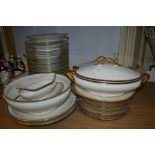 Extensive Limoges gilt and blue bordered dinner service including serving dishes, dinner plates,