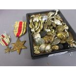 Small box containing a quantity of various military related buttons,