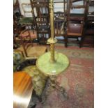 Good quality heavy gilt brass standard lamp with integral onyx table on C-scroll shaped supports