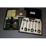 Cased set of six silver bean handled coffee spoons,