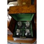 19th Century square shaped walnut decanter box containing two pairs of glass decanters