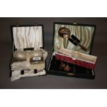 Cased pair of silver backed hair brushes and a small quantity of plated flatware