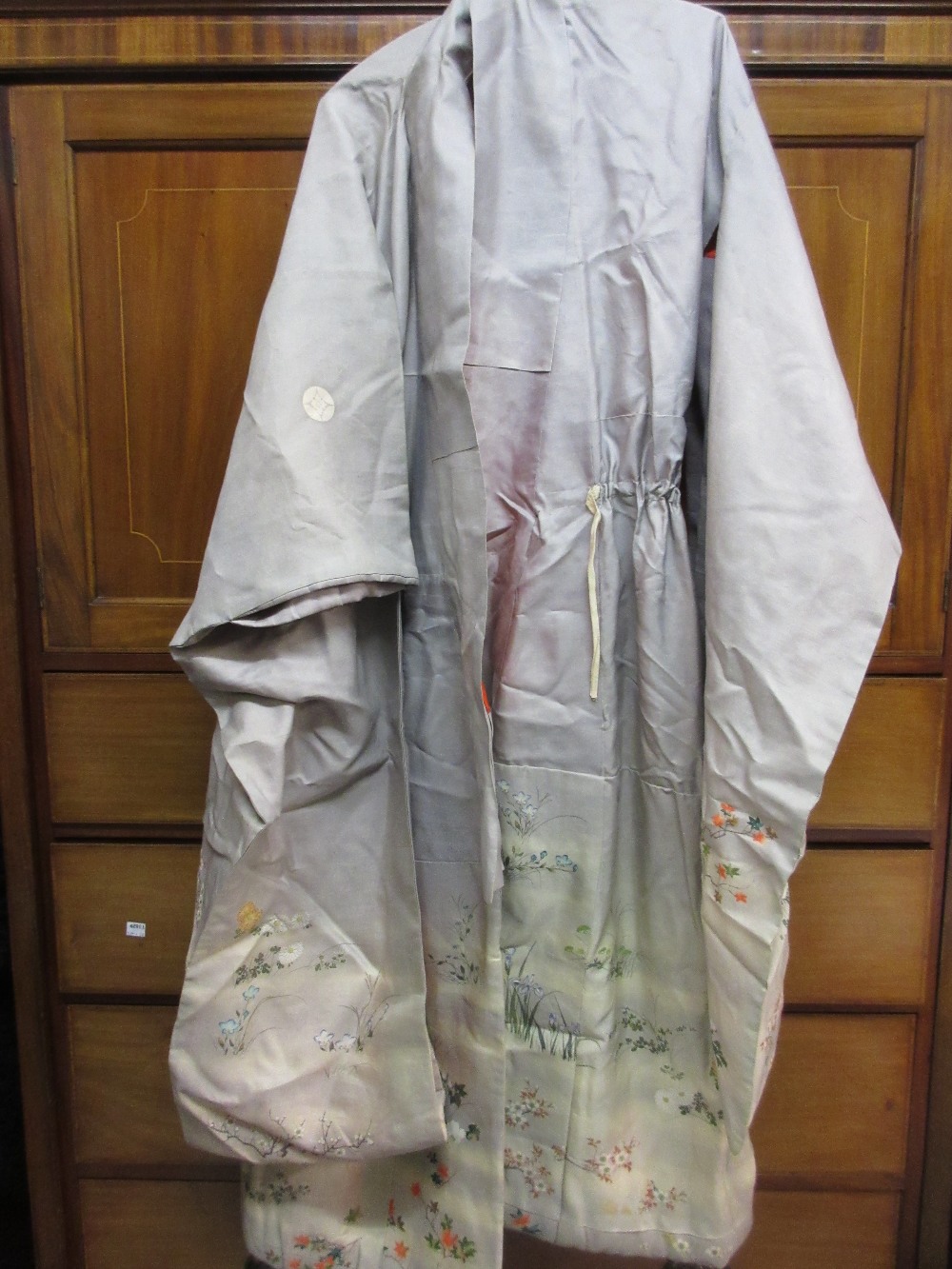 Floral pattern kimono together with a quantity of various other textiles