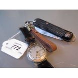 Sagara wristwatch together with a pocket knife