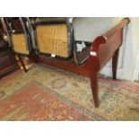 20th Century mahogany window seat having shaped ends with panelled seat on shaped supports