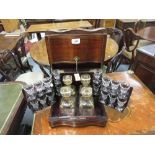 Victorian mahogany and brass inlaid decanter box of serpentine form,