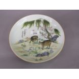 20th Century Chinese circular porcelain bowl painted with cattle in a landscape,