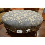 Victorian oval carved rosewood footstool with a woolwork cover