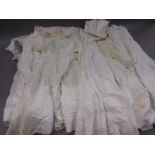 Box containing a quantity of miscellaneous textiles including: Christening gowns, embroidery,