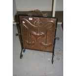 Art Nouveau embossed copper and wrought iron firescreen