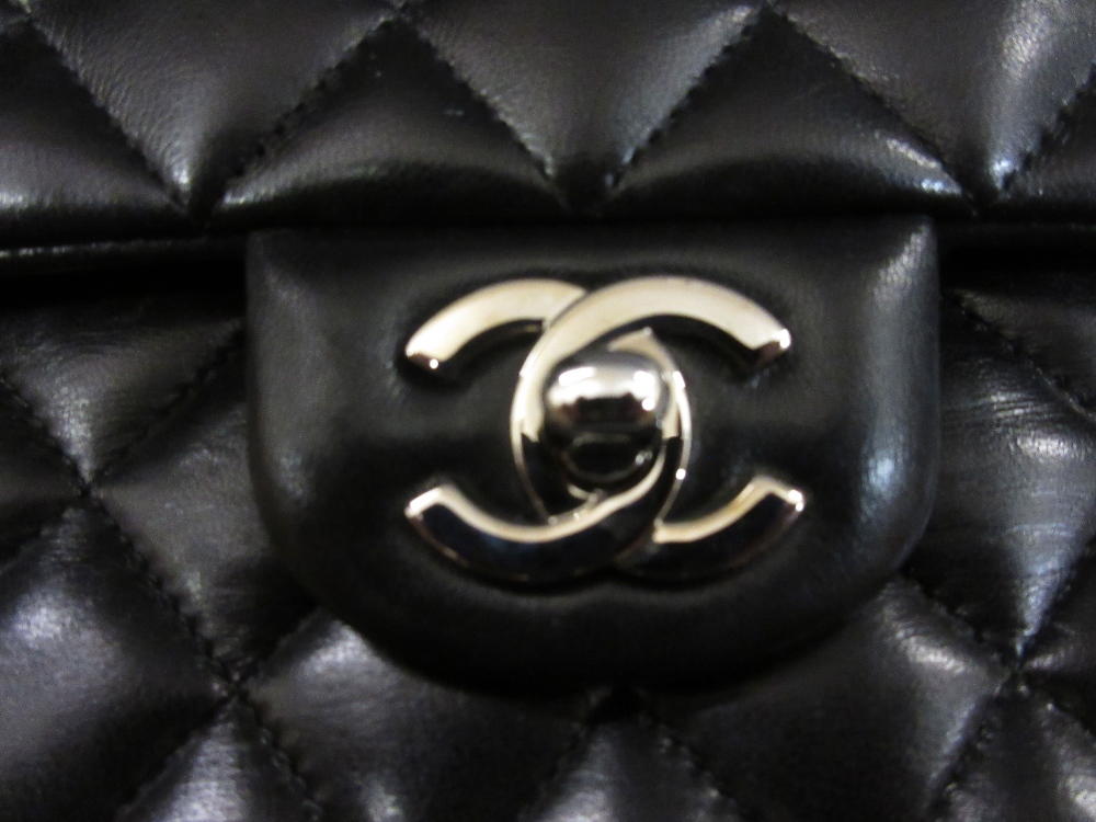 Ladies Chanel Uni black quilted handbag with original guarantee card, dust cover, - Image 7 of 7