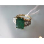 18ct Gold emerald and diamond ring, the central emerald of approximately 3.