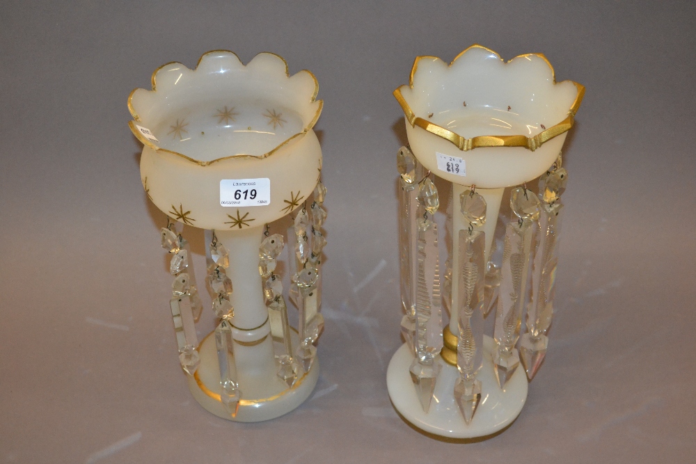 Two 19th Century opaque and gilt decorated lustres with clear cut glass drops
