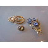 Two yellow metal floral spray brooches and a citrine set dress stud