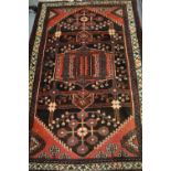 Hamadan rug with all-over medallion design with multiple borders approximately 5ft x 3ft