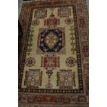 Afghan Caucasion rug with multiple medallions and borders on a beige ground,