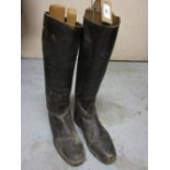 Pair of leather riding boots with trees (at fault)