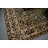 Wilton type Persian style rug of Persian design on a green ground,