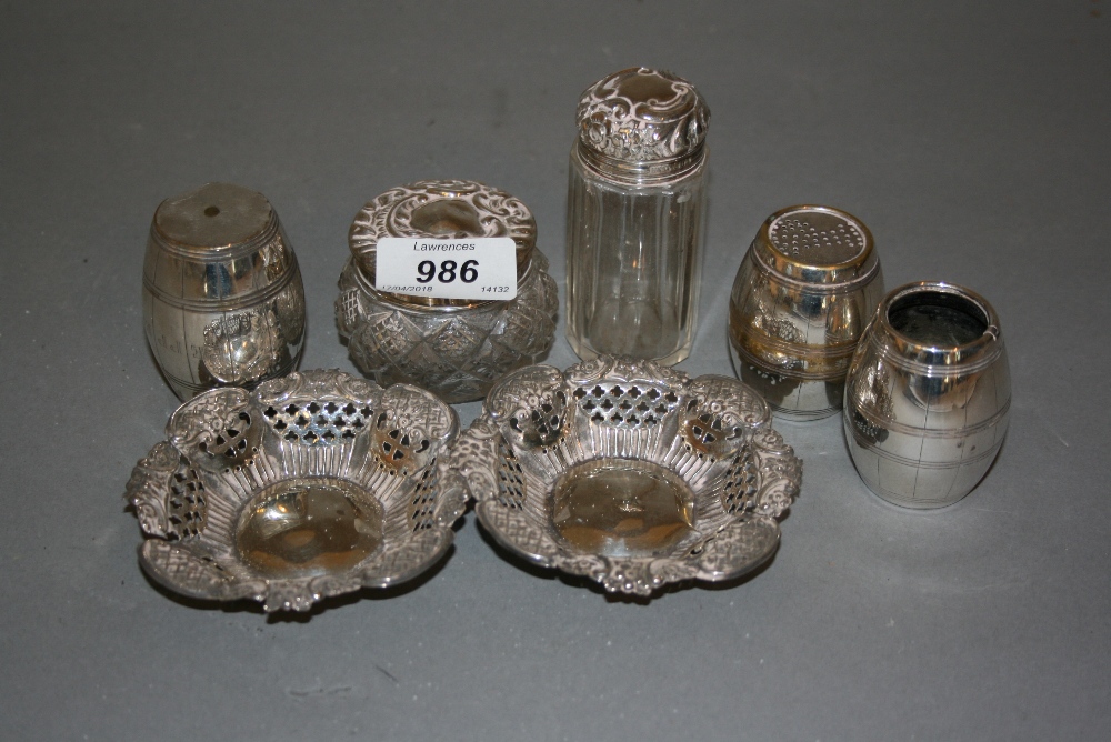 Two silver mounted glass dressing table bottles,