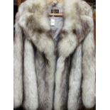 Ladies pale fur half length jacket