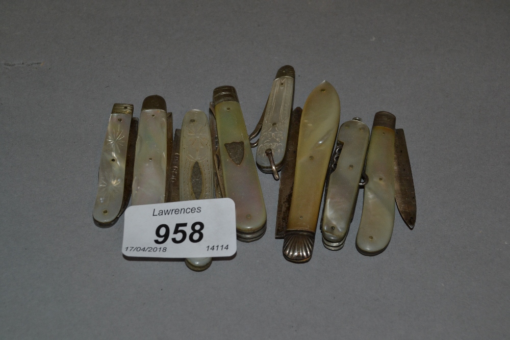 Collection of nine various mother of pearl mounted pocket knives,