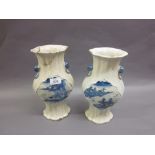 Pair of 19th Century Chinese crackleware baluster form vases painted with panels of landscapes in