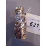 Embossed white metal cylindrical perfume bottle with floral decoration,