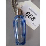Blue / clear French perfume bottle with a plain white metal lid and attached chain and stopper, 5.