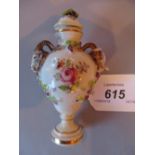 German Volkstedt porcelain perfume bottle with rams head side handles and floral decorated stopper