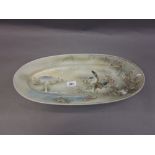 Ovoid Japanese dish decorated with bird and flowers within a landscape scene