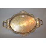 Large 19th Century silver plated oval two handled tray with embossed floral border and engraved