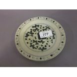 Small Chinese provincial porcelain shallow dish with a blue and white floral painted decoration,