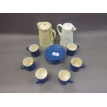 Six Moorcroft powder blue coffee cups and saucers (one cup at fault),