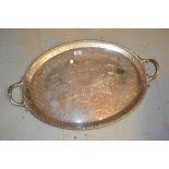 Large silver plated oval two handled tray with engraved decoration