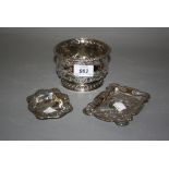 Sheffield silver floral embossed sugar basin together with two silver floral embossed trinket