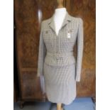 Chanel Boutique, ladies two piece jacket and skirt suit in a brown and cream check,