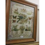 Late 19th Century French woolwork pictorial sampler, embroidered with various animals,