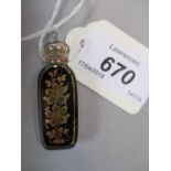 French black glass and gilt decorated floral design perfume bottle with a white metal lid and loop