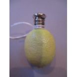 Rare 19th Century porcelain scent bottle modelled in the form of a lemon with a white metal top and