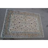 Tabriz carpet having all-over floral design with borders on a beige ground,