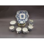 Blue and white Royal Crown Derby teaset printed with dragons and birds, comprising: cups, saucers,