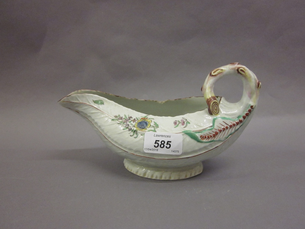 18th Century Worcester moulded cabbage leaf design sauce boat with painted floral sprigs (rim chip