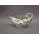 18th Century Worcester moulded cabbage leaf design sauce boat with painted floral sprigs (rim chip