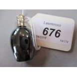 Miniature black glass French perfume bottle with dimpled white metal top, hook to rear and stopper,