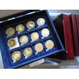 Three blue velvet cases and four other cases containing a collection of cupro nickel and other