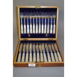 Late 19th Century walnut cased set of twelve silver and mother of pearl dessert knives and forks,