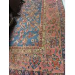 Turkish Sparta carpet of all-over floral design with multiple borders on a blue ground,