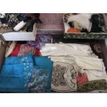 Suitcase containing a collection of miscellaneous textiles including: needlepoint, various gloves,