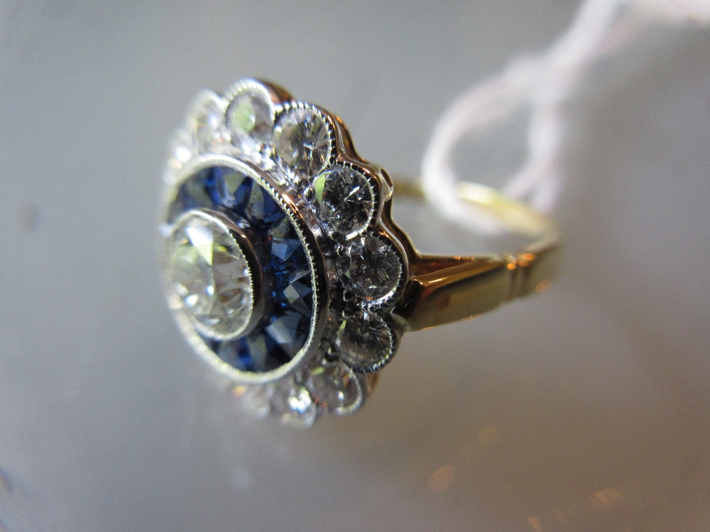 18ct Yellow gold diamond and sapphire target style ring