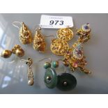 Four pairs of various yellow metal earrings, a single earring,